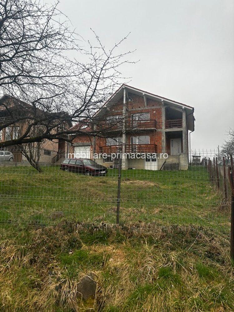 SATU NOU DE JOS, casa D+P+E 300mp , cu teren 21ari!