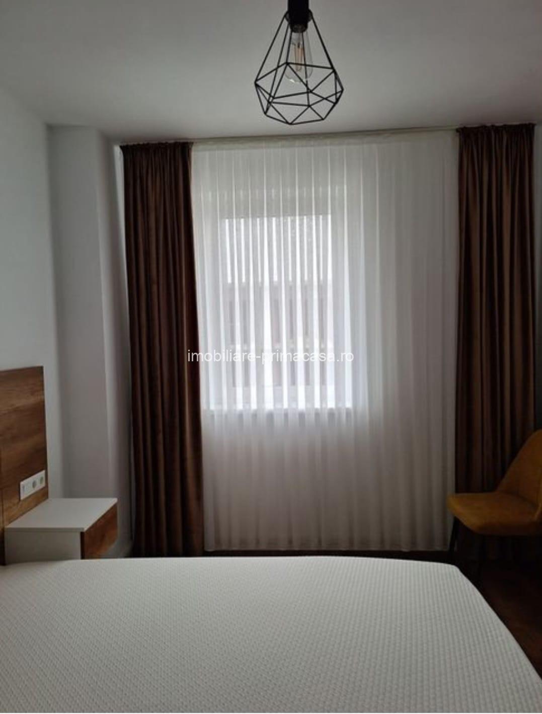 COSBUC- Bloc nou, apartament cu 2 camere, parcare interioara, 390€/Luna - imagine 9