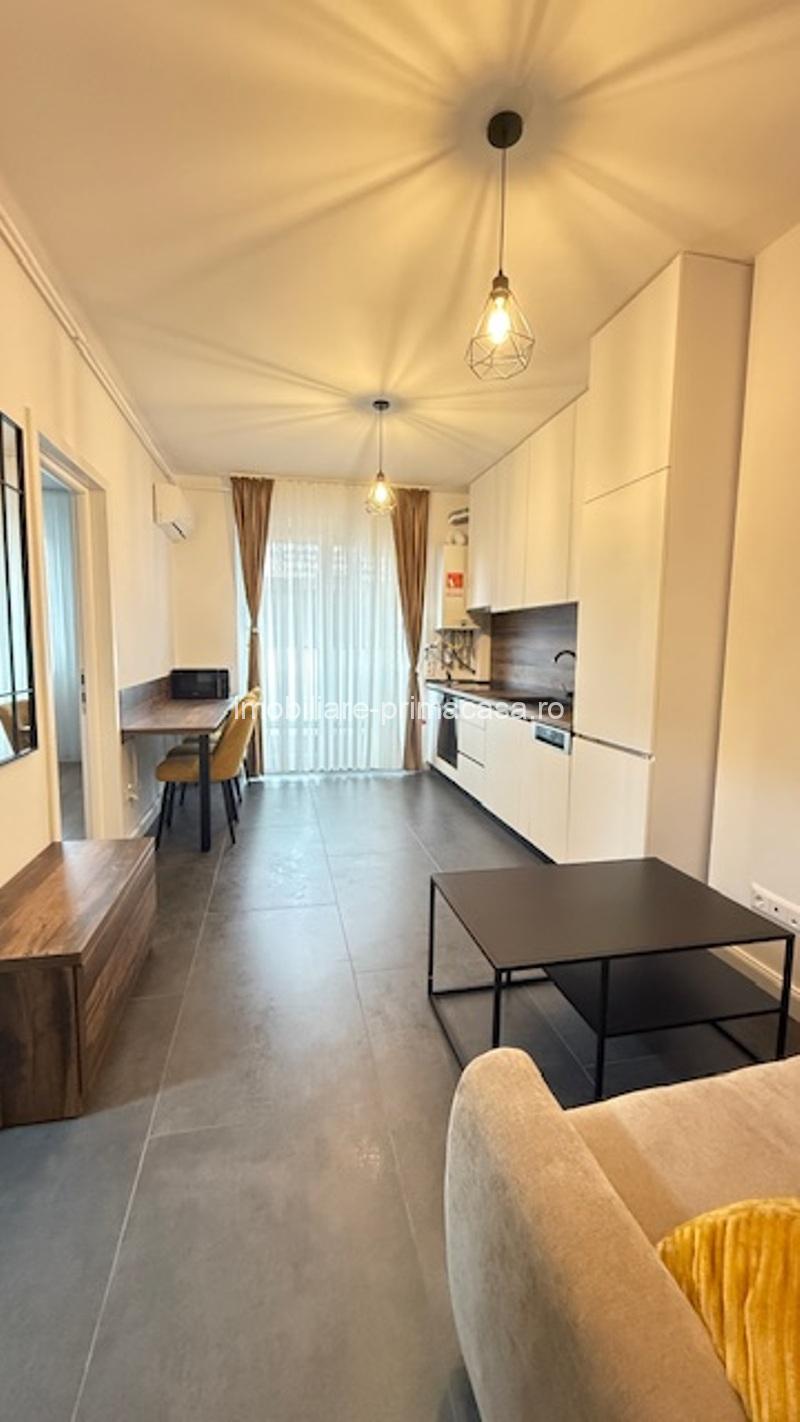 COSBUC- Bloc nou, apartament cu 2 camere, parcare interioara, 390€/Luna - imagine 7