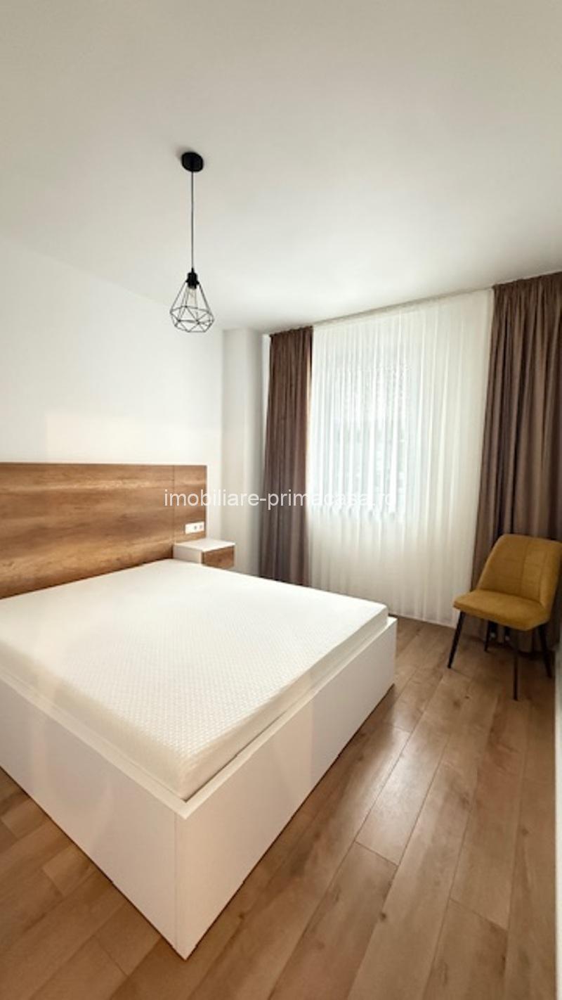 COSBUC- Bloc nou, apartament cu 2 camere, parcare interioara, 390€/Luna - imagine 6