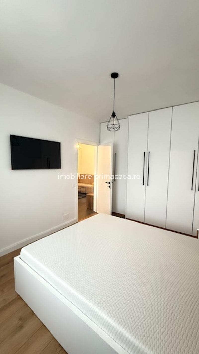 COSBUC- Bloc nou, apartament cu 2 camere, parcare interioara, 390€/Luna - imagine 5